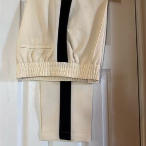 Elegant Cream Skinny Pants with Black Stripe